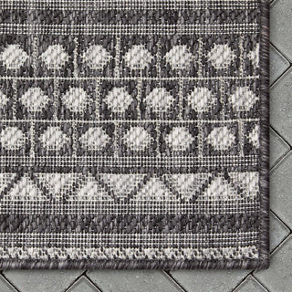 Arwen Tribal Indoor/Outdoor Black Textured Rug: 7'10" x 9'10"